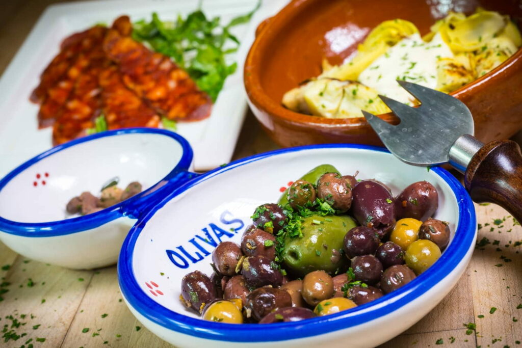 House marinated olives, chorizo and artichoke hearts